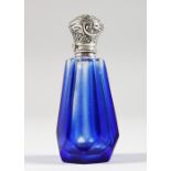 A BRISTOL BLUE GLASS HEXAGONAL SCENT BOTTLE, with silver top. 3ins high.