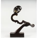 AN UNUSUAL BRONZE SCULPTURE OF A VIOLIN PLAYER. 22ins high.