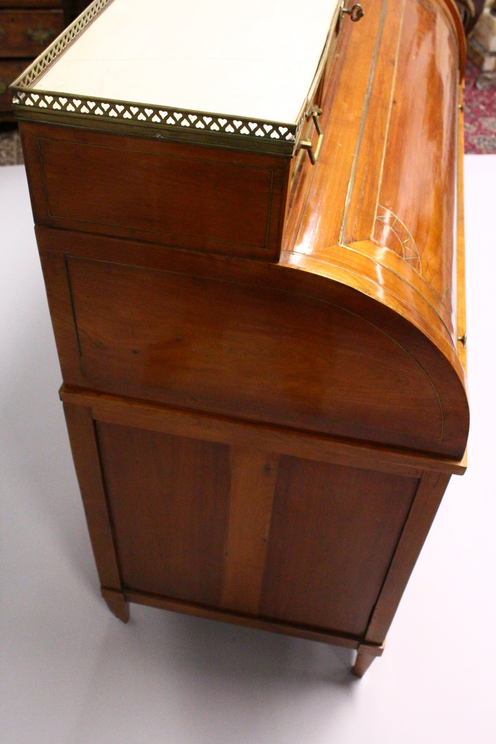 A 19TH CENTURY CONTINENTAL FRUITWOOD CYLINDER BUREAU, with brass galleried marble top, over three - Image 15 of 16