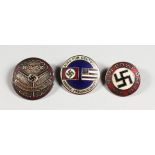 THREE SMALL REPRODUCTION GERMAN NAZI BADGES.