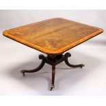 A REGENCY ROSEWOOD AND SATINWOOD BANDED TILT TOP BREAKFAST TABLE, with rounded rectangular top,