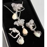 A SUITE OF ELEPHANT DESIGN , PENDANT, EARRINGS AND RING, set with opals.