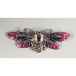 A SILVER AMETHYST SET PLIQUE ENAMEL BEE BROOCH.