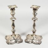 A LARGE PAIR OF SILVER CANDLESTICKS. London 1910. 12ins high.