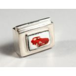A MINIATURE SILVER PILL BOX, the lid with an enamel of a cat. 1ins long.