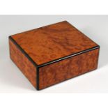 AN ELIE BLEU, PARIS BURR WOOD HUMIDOR. 9.75ins wide.