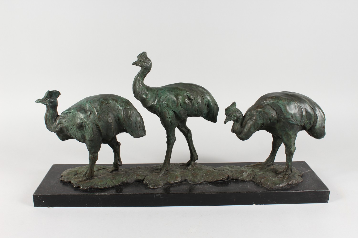 AFTER FREMIET A LONG BRONZE GROUP OF THE EMUS, on a black marble base. Signed. 24ins long. - Image 4 of 4