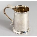 A GEORGE III PLAIN PINT TANKARD, with 'C' scroll handle. London 1783.