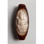 A TIBETAN AGATE CARVED BEAD. 2ins long.