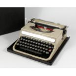 OLIVETTI, a manual typewriter, Studio Model, cased.