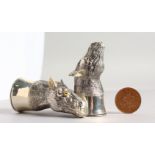 A PAIR OF CAST SILVER PLATED NOVELTY HORSES HEAD SALT AND PEPPERS.