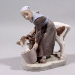 A COPENHAGEN PORCELAIN GROUP OF A YOUNG GIRL FEEDING A CALF from a bucket. Pattern 779. 6.5ins