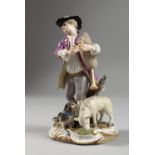 A GOOD MEISSEN PORCELAIN FIGURE OF A YOUNG MAN, playing pipes, a dog and lamb at his feet. Cross
