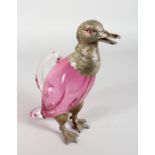 A VERY GOOD DUCK CLARET JUG, with glass body, plated head with glass eyes and plated feet. 10.5ins