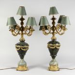 A GOOD PAIR OF CLASSICAL STYLE MARBLE AND ORMOLU URN SHAPED TABLE LAMPS, fitted for electricity,