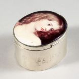 AN ENGINE TURNED SILVER OVAL SNUFF BOX, the lid with an enamel portrait of a young girl.