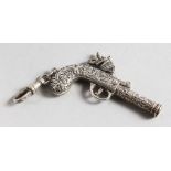A NOVELTY SILVER PISTOL WHISTLE. 2.25ins long.