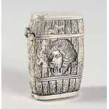 A NOVELTY SILVER-PLATE BARREL VESTA.