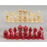 A GOOD SET OF CHINESE CARVED AND PIERCED IVORY CHESS MEN. King: 3.5ins high.