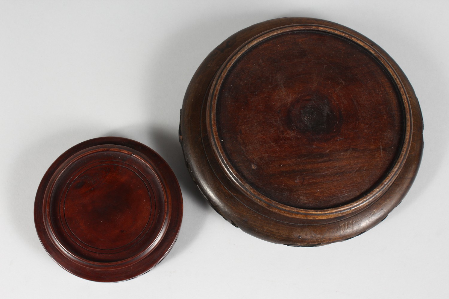 TWO CHINESE PIERCED HARDWOOD STANDS. 7.5ins x 4.5ins diameter. - Image 3 of 3