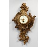 A SMALL 19TH CENTURY CONTINENTAL GILT BRONZE WALL CLOCK, with enamelled porcelain dial. 9.75ins