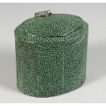 A GEORGE III DESIGN SHAGREEN OVAL TEA CADDY. 4ins high.