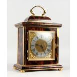 A SUPERB ASPREY LUXOR BRASS AND TORTOISESHELL BRACKET CLOCK, with silvered dial, black Roman