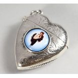 AN ENGRAVED SILVER HEART SHAPE VESTA CASE, with later enamel decoration.