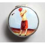 A SMALL SILVER CIRCULAR PILL BOX, the lid with an enamel of a golfer.