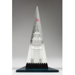 A RUSSIAN PERSPEX CLOCK TOWER PAPERWEIGHT. 7ins high.