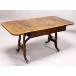 A REGENCY ROSEWOOD SOFA TABLE, with rounded rectangular top, two real and two dummy frieze