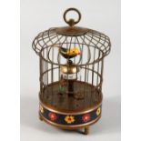 A NOVELTY MINIATURE BIRD CAGE CLOCK. 8ins high.