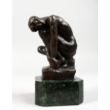 AFTER A. RODIN A SMALL BRONZE "THE THINKER". Signed, on a marble base. 6.5ins high.