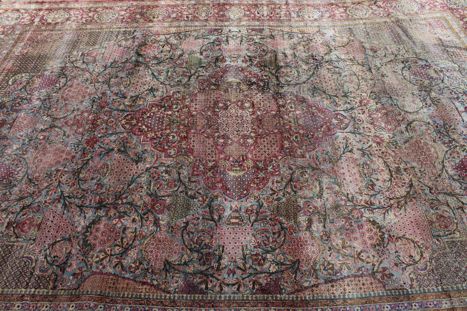 A 19TH/20TH CENTURY PERSIAN TEHRAN SILK CARPET, red ground with numerous vases of flowers, panels of - Image 8 of 15