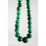 A VERY GOOD LONG SET OF MALACHITE BEADS.