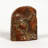 A MINIATURE CHINESE BRONZE MOUNTAIN SEAL. 1.75ins high.