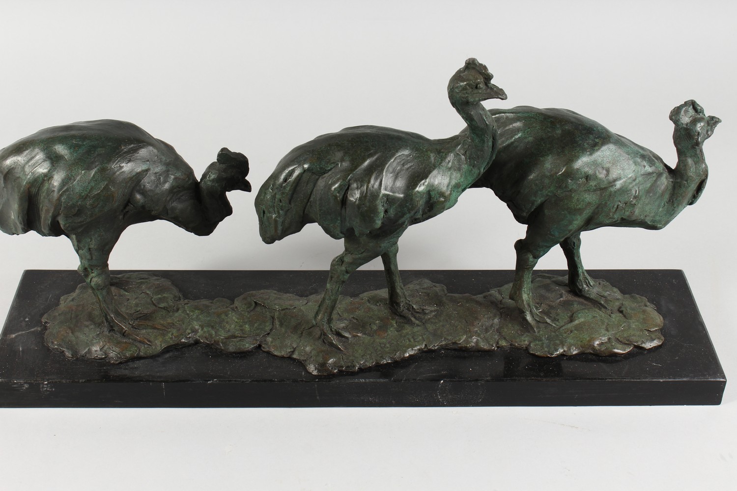 AFTER FREMIET A LONG BRONZE GROUP OF THE EMUS, on a black marble base. Signed. 24ins long. - Image 2 of 4