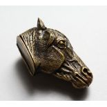 A NOVELTY BRASS HORSES HEAD VESTA and SNUFF BOX COMBINED. 2.25ins.