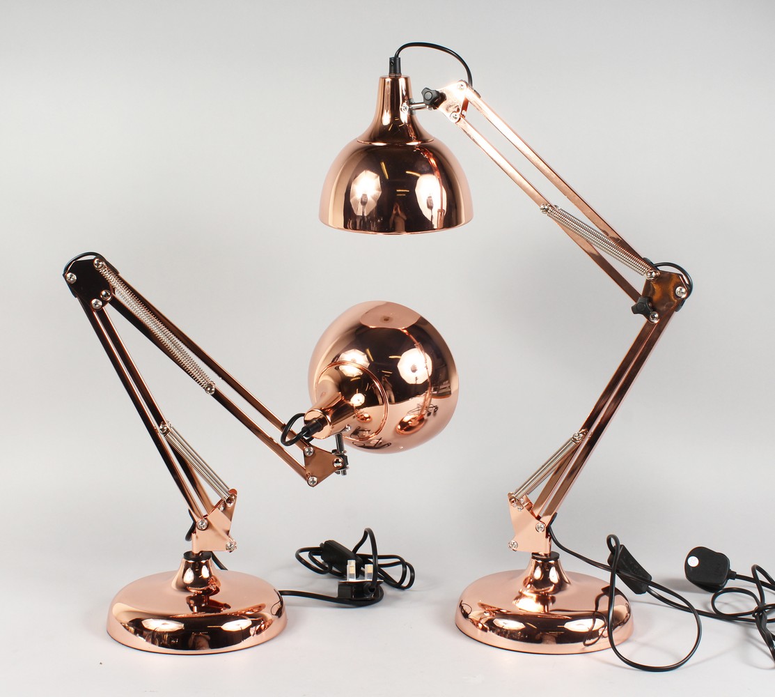 A PAIR OF LARGE COPPER ANGLEPOISE LAMPS.