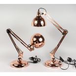 A PAIR OF LARGE COPPER ANGLEPOISE LAMPS.