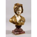 J. B. CREUZE (CIRCA. 1910) A GOOD SMALL GILT BRONZE AND IVORY BUST OF A YOUNG GIRL, on a marble