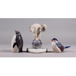 THREE SMALL COPENHAGEN PORCELAIN GROUPS, an infant faun on a sphere, 10cm high, Pattern 2218, a