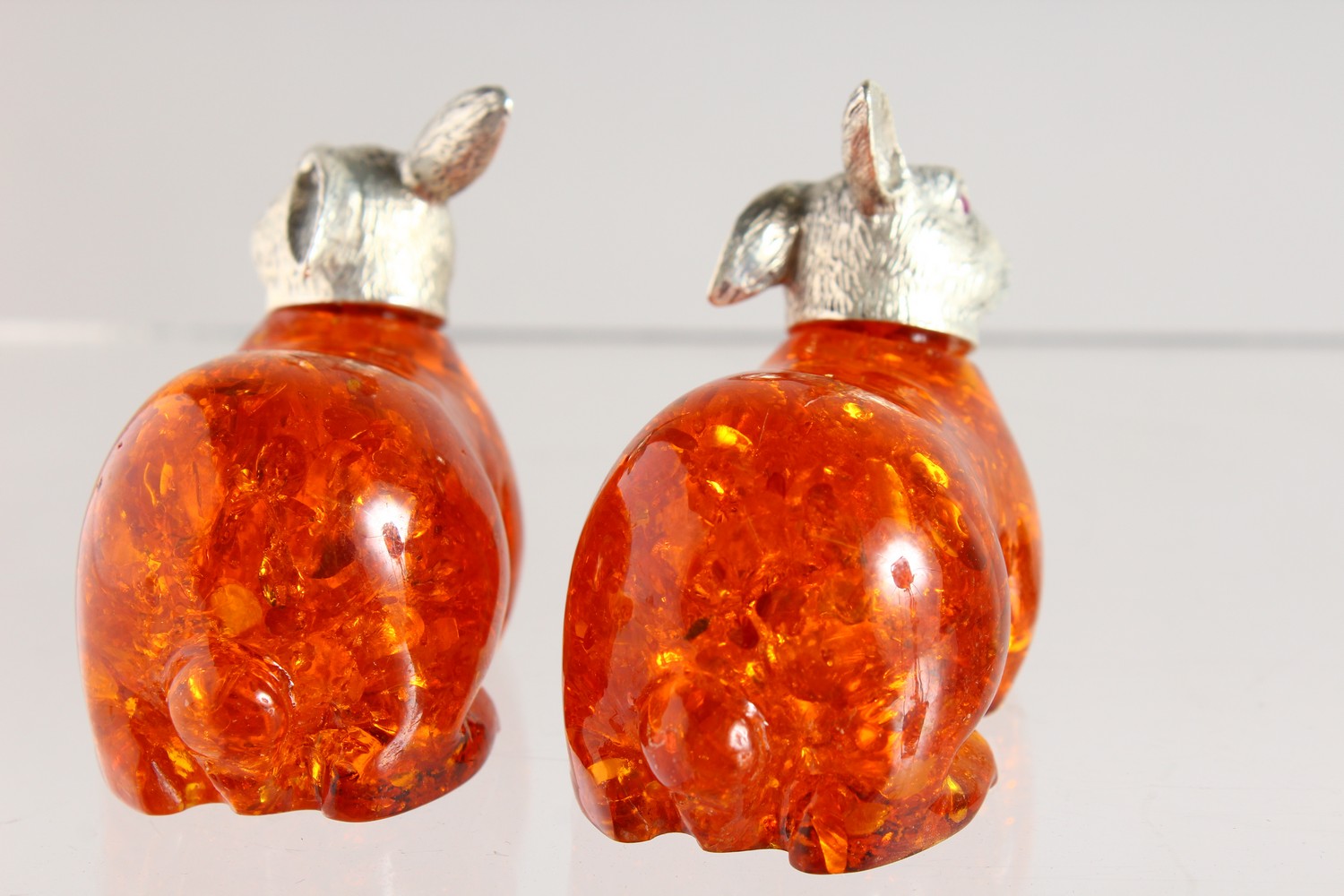 A PAIR OF NOVELTY AMBER AND .800 RABBITS. - Image 2 of 6