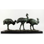 AFTER FREMIET A LONG BRONZE GROUP OF THE EMUS, on a black marble base. Signed. 24ins long.