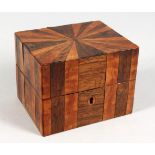 AN INLAID SEGMENTED SPECIMEN WOOD JEWELLERY BOX. 5ins wide.