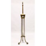 AN EMPIRE METAL STANDING LAMP, inset with three Wedgwood plaques, on triple curving legs. 5ft 4ins