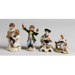 FOUR SMALL CONTINENTAL PORCELAIN FIGURES, a pair of cherubs, a monkey, boy with flowers, and a