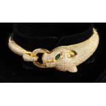 A SILVER AND GOLD-PLATED PANTHER BRACELET.