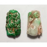 TWO CHINESE CARVED JADE PENDANTS. 2ins and 2.25ins high.