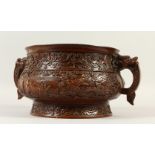 A GOOD LARGE BRONZE CENSER, with dragon handles, the body decorated with figures in a landscape